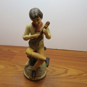 P 7 Vintage 8&quot; H Bisque Porcelain Figurine  Len wile Ardalt Boy With Guitar Great Shape 1970