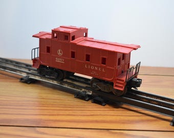 T 567 O-O/27 Lionel 6257 Caboose Vintage 1947 Well weighted & Metal Wheels Great Shape