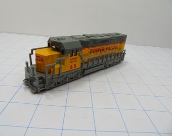 MH 288 Power Pacific Freight Engine Pull Back Die Cast Yellow/Gray - Brand New Old Stock