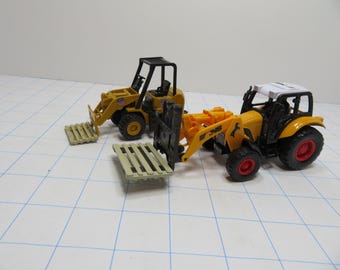 F 25 NS & American Skid Loaders Set Of (2) Die Cast And  Plastic Brand New Old Stock