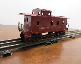 T 726 Lionel O Gauge Caboose Lionel Lines 6017 Well Weighted, Metal Wheels, Operating Coupler Great Condition