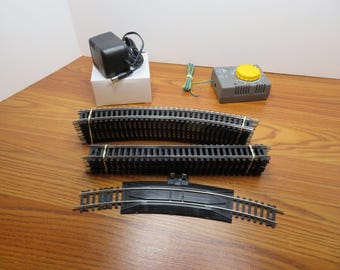 T 438 HO Mehano IHC #f370 Transformer (12) 18R Curves, (8) Straights Includes Terminal Track & Power Pack Brand New Old Stock 2001