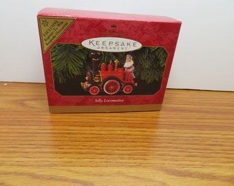 H 807 Keepsake Die Cast Hand Crafted Jolly Locomotive Ornament 1999 New Old Stock