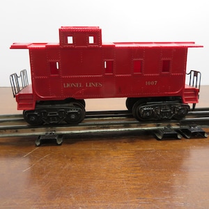 T 718 Lionel O Gauge Caboose 1007 Lionel Lines 1950&#39;s Well Weighted, Metal Trucks & Wheels Great Condition