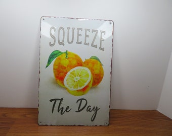 Squeeze The Day" Vintage Tin Sign New Old Stock - 12" L x 8" W