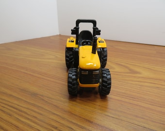 T 36 Die Cast Power Farm Tractor Yellow 4" Pull Back New Old Stock