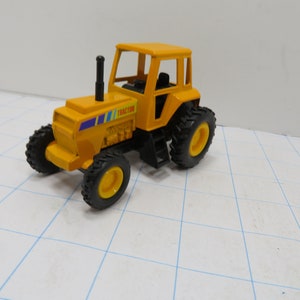 MH 449 Die-Cast 3.75&quot; Farm Tractor Pull Back Yellow - Brand New Old Stock