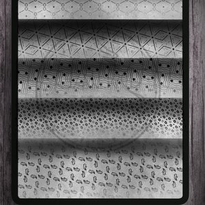 May include: A digital tablet displaying a variety of black and white patterns on a gray background. The patterns are arranged in a spiral shape, creating a visual illusion of depth.
