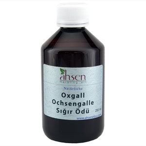 Könnte beinhalten: Eine braune Glasflasche mit weißem Verschluss, beschriftet mit "Oxgall Ochsen Galle Sığır Ödüsü" und "250 ml". Die Flasche ist mit dem Markennamen "ahsen marbling art" und der Website-Adresse "www.ahsenbru.com" versehen.