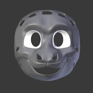 May include: A gray, smiling mask with large, oval eye openings and a series of small holes around the top. The mask has a friendly, cartoonish design, with a wide, open mouth and a slightly upturned nose.