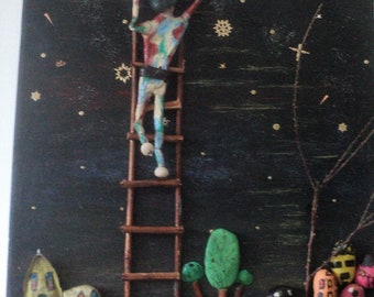 Tableau et galets," décrocher la lune', peinture acrylique, bois naturel, personnage en pâte à papier, tableau fait mains