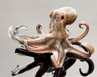Octopus in Murano glass. Realistic realization in glass multicoloured.Sculpture of the glass master.