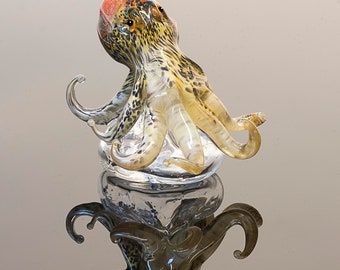 Octopus in Murano glass. Realistic realization in glass multicoloured.Sculpture of the glass master.