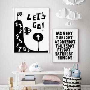 May include: Black and white illustration of a car driving up a hill with numbers 1 through 9. The text "LET'S GO!" is above the car. A second black and white illustration shows the days of the week, Monday through Sunday.