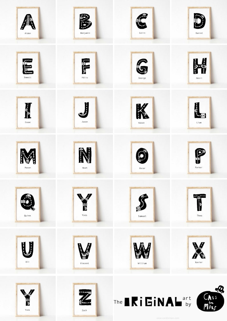 May include: A set of 26 alphabet posters featuring black letters with a road design on a white background. Each poster has a name below the letter. The posters are framed in a light wood frame.