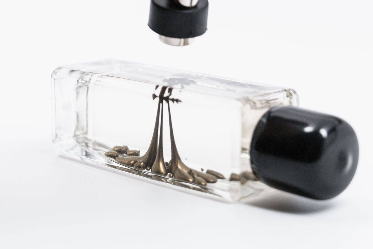 Ferrofluid Motion Magnetic Liquid Bottle Display by Concept Zero 