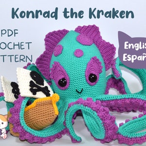 May include: A crochet pattern for a teal and purple octopus named Konrad the Kraken. The pattern includes instructions for making a small ship for the octopus to hold. The pattern is available in both English and Spanish.