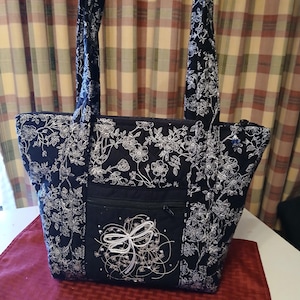 Quilted 2strap purse with 10 pockets makeup pouch included black and white print,emb dragonfly on front pocket