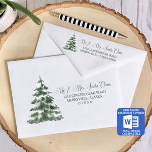 May include: White envelope with a watercolor illustration of a green pine tree and the text "Mr. & Mrs. Santa Claus 1218 GINGERBREAD ROAD MERRYVILLE, ALASKA 02856" printed in black.