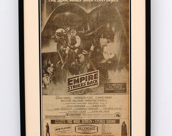 Star Wars. The Empire Strikes Back Film Advert . May 23 1980. Original Newspaper Framed.  Hans Solo, Chewbacca , Darth Vader, Luke Skywalker