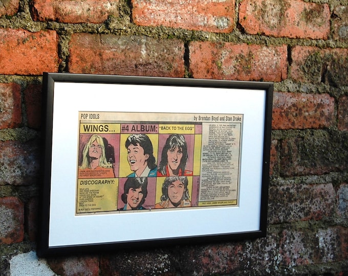 Wings Framed Original Art. Comic. Paul McCartney, Linda McCartney, Denny Laine, Steve Holly. Beatles. Dated 19th August 1979