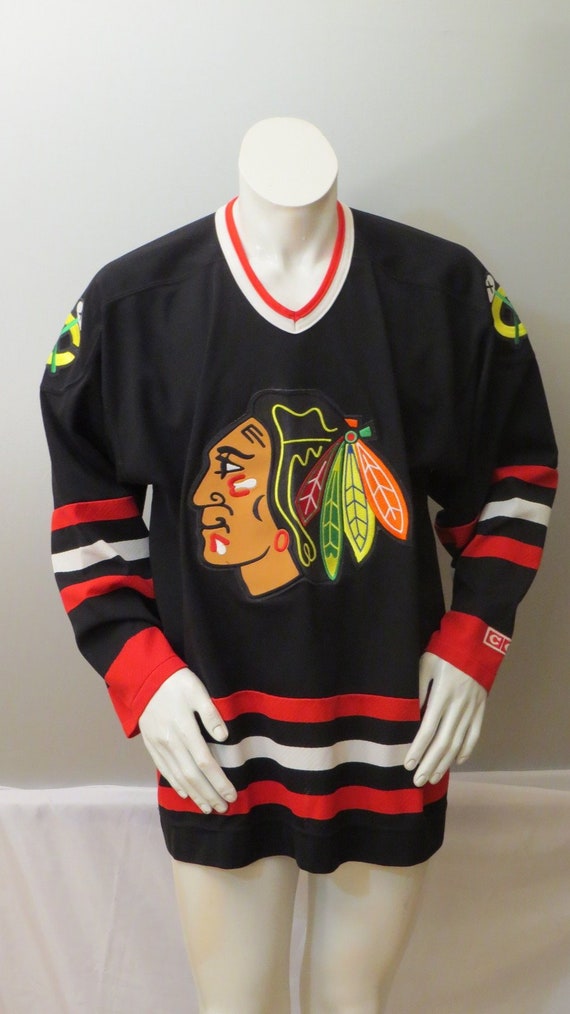 black on black blackhawks jersey