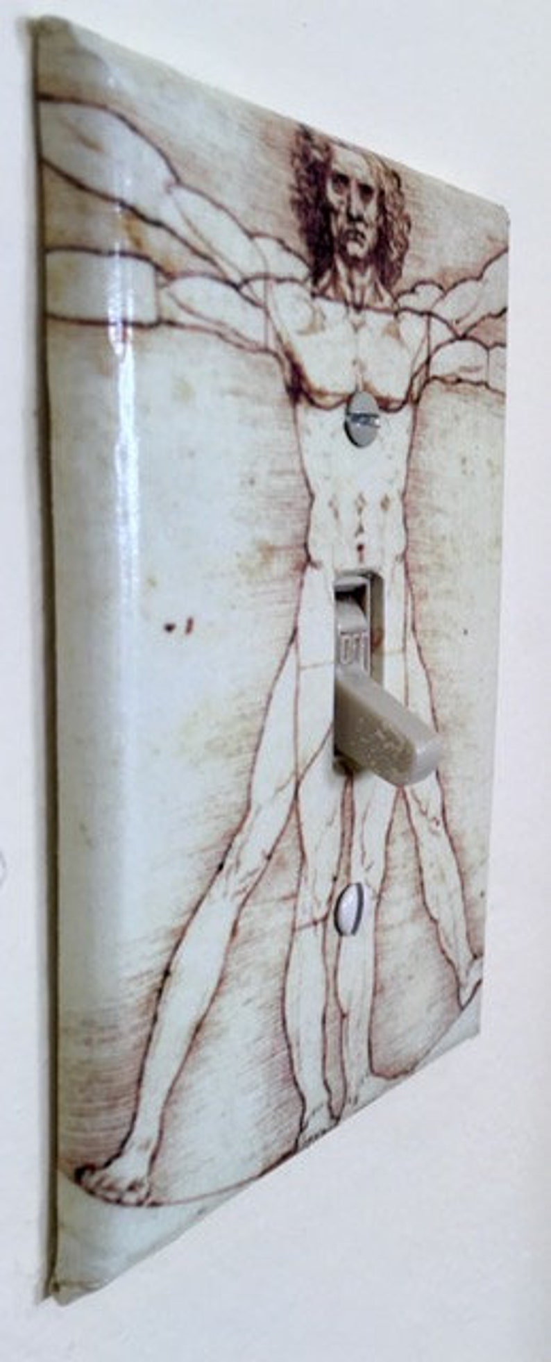 /'Vitruvian Man/' Light switch plate cover