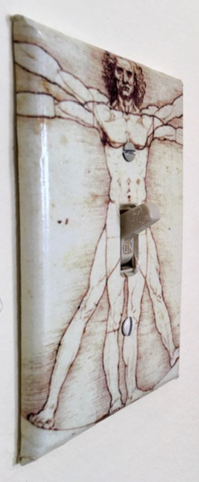 /'Vitruvian Man/' Light switch plate cover