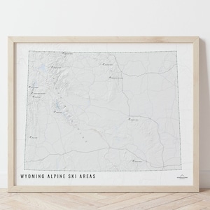 May include: A white and gray map of Wyoming with the text "WYOMING ALPINE SKI AREAS" at the bottom. The map shows the locations of various ski areas throughout the state.