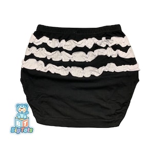 May include: Black and white ruffled baby bloomers with a white elastic waistband.