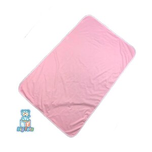 May include: Pink waterproof mattress pad with white trim. The pad is made of soft, breathable fabric and is designed to protect mattresses from spills and accidents.