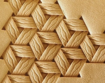 May include: Close-up of a light brown leather surface with a woven pattern of triangles. The pattern is embossed into the leather, creating a textured effect.