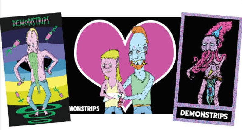 May include: Three colorful stickers with cartoon characters and the text "Demonstrips". The first sticker features a pink and green character with a long green beard. The second sticker features two characters, one pink and one blue, standing in front of a pink heart. The third sticker features a pink and blue character with a long blue tentacle beard.