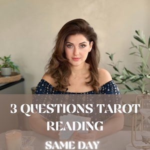 May include: A woman with long brown hair is seated at a table. The text "3 Questions Tarot Reading Same Day" is overlaid on the image. Candles and tarot cards are visible on the table.