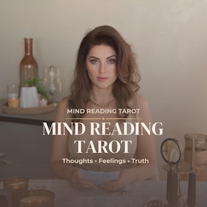 May include: A woman with long brown hair and a gold necklace is centered in the image. The text "MIND READING TAROT" is displayed above and below the title. The words "Thoughts • Feelings • Truth" are also visible. A magnifying glass and candles are on the table.