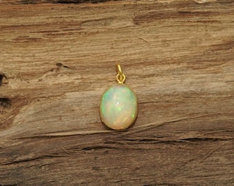 14K Gold Ethiopian Opal Pendant: Oval October Birthstone Necklace