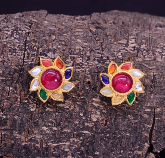 Tribe by Amrapali - Navratna jewellery is not only for the spiritually  inclined, but also for those looking to level up their style. Pair these  stunning gold-plated earrings with the nine gems