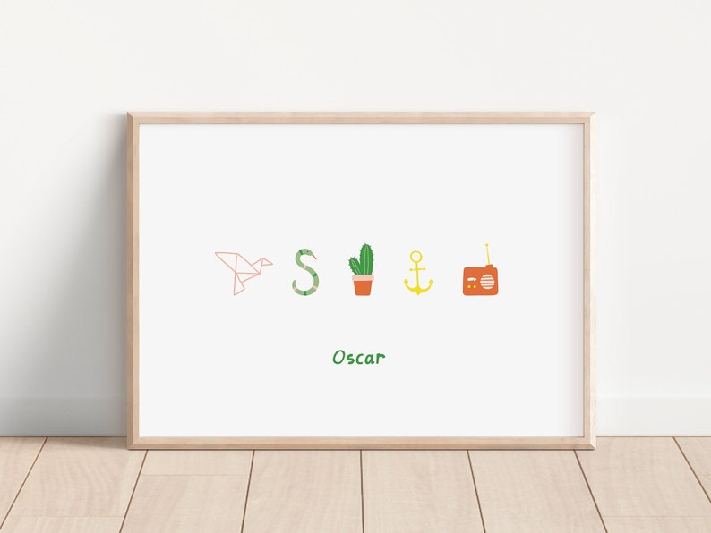 May include: A framed print with a white background and a light wood frame. The print features five colorful illustrations: a paper airplane, a snake, a cactus in a pot, an anchor, and a vintage radio. The text "Oscar" is printed below the illustrations.