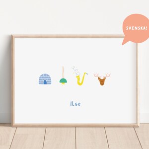 May include: A framed print with a white background and colorful illustrations of an igloo, a lightbulb, a saxophone, and a reindeer. The text "Ilse" is written below the illustrations. The text "SVENSKA!" is written in a speech bubble in the upper right corner of the image.