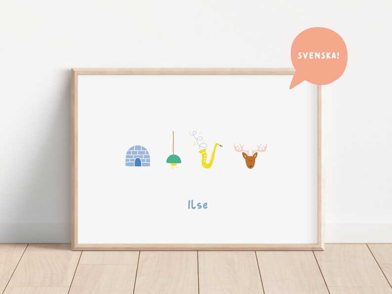 May include: A framed print with a white background and colorful illustrations of an igloo, a lightbulb, a saxophone, and a reindeer. The text "Ilse" is written below the illustrations. The text "SVENSKA!" is written in a speech bubble in the upper right corner of the image.