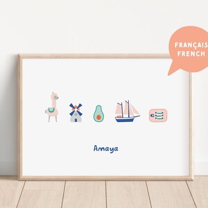 May include: A framed print with a white background and colorful illustrations of a llama, windmill, avocado, sailboat, and a box of fish. The text "Amaya" is printed below the illustrations. The text "FRAN&Ccedil;AIS FRENCH" is printed in a speech bubble in the top right corner.