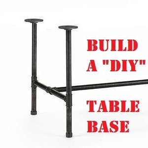 May include: Black metal table base with a DIY design. The base features two vertical supports with round tops, connected by horizontal pipes and joints. The text "BUILD A DIY TABLE BASE" is in red.