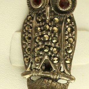 Vintage Sterling silver and Marcasite Owl brooch with red garnet eyes