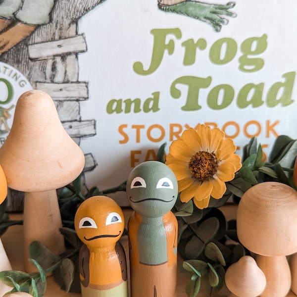 Muñecos de clavija de rana y sapo