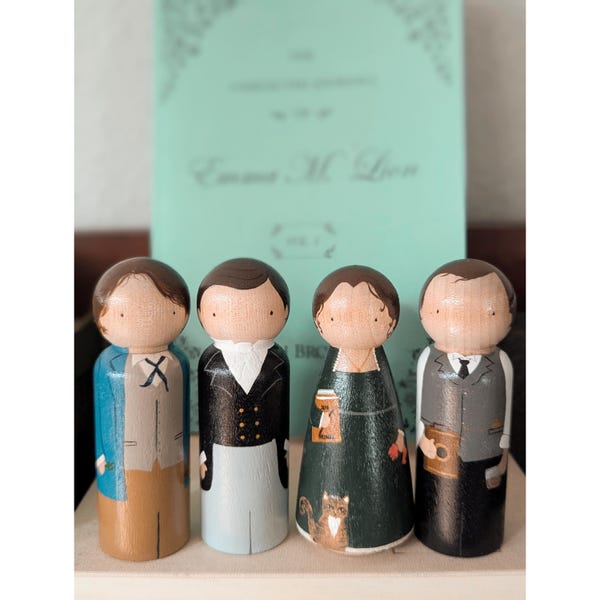 Emma M. Lion Figurines