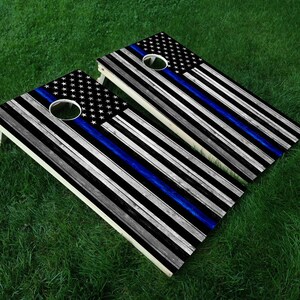 Blue Line American Flag Cornhole Wraps • Set of 2 - Cornhole Decals • Comes with Squeegee & Edge Seal Tape • FREE Shipping