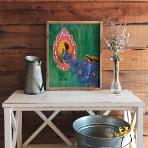 May include: A framed painting of a woman in a blue dress standing in a pink ornate frame surrounded by blue flowers. The background is a green and blue abstract design.