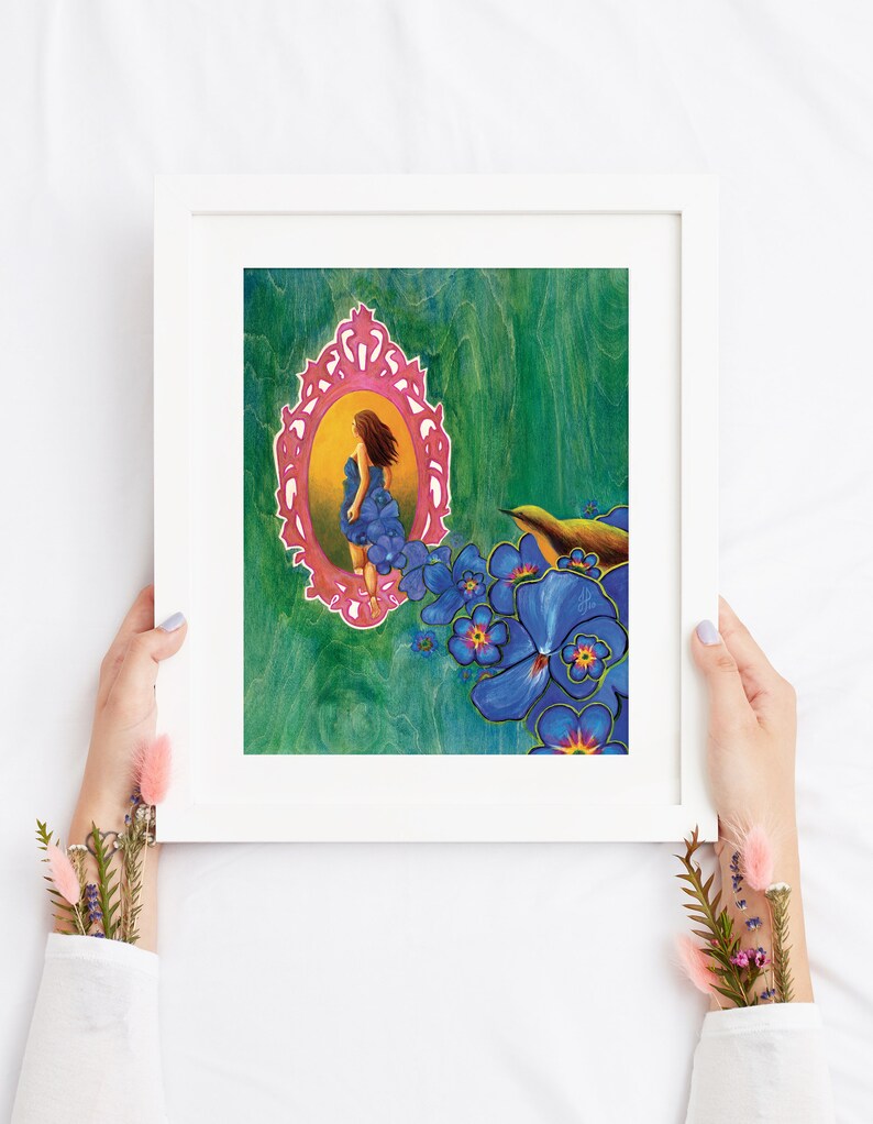 May include: A framed painting of a woman in a blue dress made of flowers, standing in a pink ornate mirror. The background is a green and brown textured surface with blue flowers and a yellow bird.