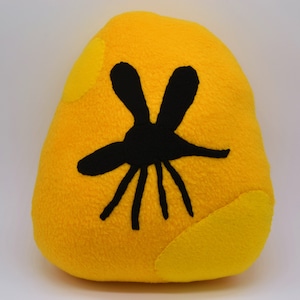 Mosquito atrapado en almohada de peluche fósil