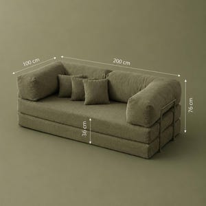 May include: Olive green modular sofa with three matching throw pillows. The sofa is 200 cm long, 100 cm wide, and 76 cm high. The seat height is 36 cm. The sofa has a corduroy texture and a metal frame.